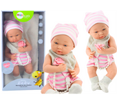 Muñeca Con Ropa Blanca Y Rosa, Gorro, Chupete, Babero Y Colcha.