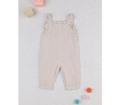 Peto niña beige con volantes