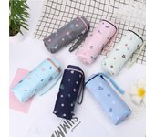 Mini paraguas pequeño de bolsillo para mujer, paraguas de sol Anti UV, paraguas portátil plegable ligero a prueba de viento y lluvia para niño y niña