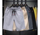 Pantalones cortos de playa elásticos casuales de cinco puntos para hombre 4XL negro