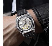 Reloj mecánico automático de doble cara ahuecado con tendencia antigua grabada resistente al agua para hombre