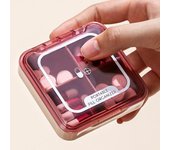Pastillero portátil mini de 4 rejillas, transparente, duradero y a prueba de humedad, organizador color rosa