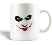 Taza de cerámica con la cara arrancada del Joker
