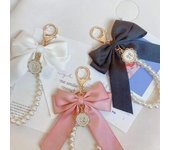 Accesorio colgante para bolso de llave, llavero con lazo de perlas de imitación, bonito llavero con pulsera de cuentas para bolso, mochila, cinta con dije para coche beige