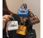 Mini colgante de platino con diseño de avestruz: Lindo llavero, bolsa para auriculares y funda protectora Universal Earphone Accessories azul