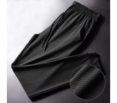 Pantalones de seda de hielo de verano para hombre, pantalones secos rápidos finos informales transpirables de malla, pantalones sueltos elásticos con pies de viga, pantalones deportivos para Fitness M negro