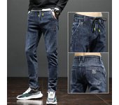Pantalones vaqueros de cintura elástica para hombre, pantalones pitillo a juego a la moda para hombre, pantalones azules elásticos de marca de moda para primavera y otoño 27