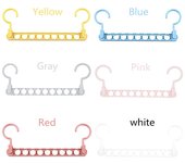 Percha de ropa mágica de 9 agujeros, percha plegable multifunción, percha de ropa giratoria color rosa