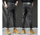 Primavera nuevos pantalones vaqueros elásticos regulares para hombres pantalones de pies casuales suaves y cómodos simples y versátiles para hombres 38