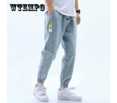 Pantalones vaqueros de cintura elástica con cordones de verano y otoño, pantalones Harem de nueve puntos para hombres, pies casuales de tendencia suelta XXXL