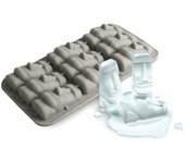 Bandeja con molde para cubitos de hielo y chocolate en forma de Moai