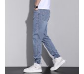 Pantalones vaqueros versátiles para niños de marca de moda de primavera y verano, tendencia ajustada elástica de algodón para hombres, pantalones largos versión coreana, pantalones para hombres 38