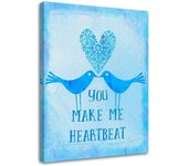 Cuadros en Lienzo Dos pájaros sobre fondo azul con la inscripción You Make Me Heartbeat 40x60 azul
