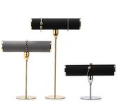 Elegante expositor para pulseras y relojes, ideal para joyas y anillos.