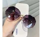 Gafas de sol de montura grande de alta gama y moda 2024 para mujer: Diseño sin marco, anti-ultravioleta y adelgazante facial null