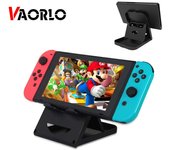 VAORLO ABS soporte compacto plegable ajustable soporte de juego base para controlador de consola Nintendo Switch para todos los teléfonos inteligentes negro