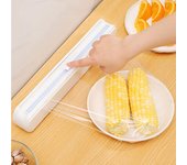 Dispensador de film transparente con fijación tipo succionador Herramienta de cocina Cortador de film plástico Herramienta para utensilios de cocina Cortador de film para alimentos blanco