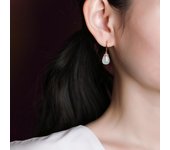 Pendientes de plata de ley S925 chapados en oro Hotan Jade zafiro temperamento elegantes pendientes de gota de agua pendientes blancos versátiles 2.9cm