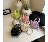Bolso para niños 2024 Nuevo bolso redondo con patrón de lichi de moda europea y americana, bolso de mano pequeño y popular, bolso cruzado para padres e hijos, para mujer