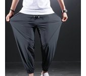 Pantalones anchos para hombre, pantalones deportivos que engordan, pantalones holgados informales de gran tamaño, elásticos y finos XXXXXL negro