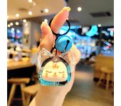 Llavero con forma de zorro de dibujos animados, diseño de botella de arena movediza, bonito llavero con forma de muñeca, colgante creativo de mochila Kawaii, accesorios de decoración, regalos azul