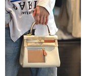 Bolso de mano para mujer, de piel de vacuno, ligero y de lujo, con un nuevo diseño en contraste, a juego con el bolsillo, portátil y moderno, 2025