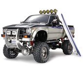 Coche eléctrico RC Tamiya Toyota Hilux High Lift 1/10 n.º 397 puro