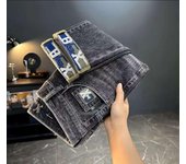 Pantalones vaqueros elásticos con estampado bordado de marca de moda de felpa gruesa/regular para hombre de Four Seasons, pantalones de nueve centavos con estampado gris ahumado y multiusos a la moda 28