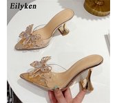 Zapatillas de mujer con lazo de cristal a la moda de Eilyken, zapatillas sexis con punta en pico y tacones extraños, sandalias transparentes de PVC, zapatos deslizantes 35 champagne