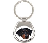 Dobermann, Doberman Pinscher, Dobie - geometric keychain with a photo and the inscription Art-Dog blanco