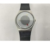OTROS RELOJES SWATCH GRIS PUNTO