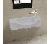 Lavabo con orificio para grifo de cerámica blanca para baño.