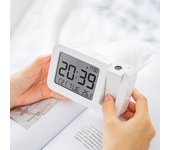 Reloj despertador de proyección con indicador de temperatura.