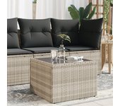 Mesa de jardín con tapa de cristal gris claro en resina trenzada