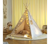 Tipi infantil con alfombra y guirnaldas.