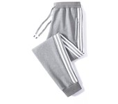 Pantalones casuales de algodón puro para hombres 2025 nuevos pantalones deportivos de otoño de gran tamaño más versátiles pantalones de chándal sueltos de otoño e invierno para hombres