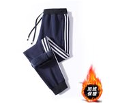 Pantalones casuales de algodón puro para hombres 2025 nuevos pantalones deportivos de otoño de gran tamaño más versátiles pantalones de chándal sueltos de otoño e invierno para hombres