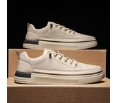 La tendencia de los zapatos blancos es elástica con zapatos masculinos, la superficie de la piel es baja, los zapatos de tablero son planos y los zapatos casuales son individuales para hombres.