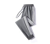 Pantalones casuales de algodón puro para hombres 2025 nuevos pantalones deportivos de otoño de gran tamaño más versátiles pantalones de chándal sueltos de otoño e invierno para hombres