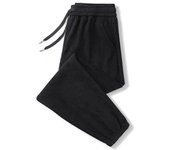 Pantalones casuales de pana de otoño e invierno pantalones de hombre 2025 nuevos pantalones de chándal sueltos de lana pantalones atados para adolescentes marea