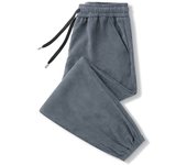 Pantalones casuales de pana de otoño e invierno pantalones de hombre 2025 nuevos pantalones de chándal sueltos de lana pantalones atados para adolescentes marea