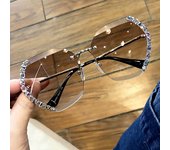 Gafas de sol anti-ultravioleta de diamante versión coreana femenina de celebridades de Internet con el mismo protector solar conducción ins cara redonda sombrilla marea gafas de sol para mujer