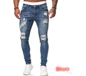 Vaqueros de hombre con insignia bordada, rodillas rasgadas y pantalones pitillo con cremallera