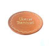 Vuelve tortilla tradicional de barro rojo