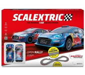 Pista Scalextric Open Rally. Incluye coches con luz,mando con turbo ,vallas,puente,rampa 5,2 metros de pista. 233x77 cm. (U10543S500)