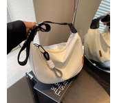 Bolso de lona bolso de paseo oblicuo para mujer 2025 nuevo bolso de hombro bolso de bola de masa versátil bolso de tela deportivo informal para mujer