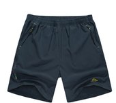 Pantalones atléticos con bolsillos y cintura elástica para hombre, ropa deportiva secado rápido, pantalones cortos playa de