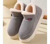 Zapatos de algodón con tacón para interior de nuevo estilo de invierno para que las parejas los usen al aire libre con tacón y botas de nieve para hombre de suela gruesa y cálidas de terciopelo para interiores