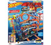 Hot Wheels City “Let's Race - ¡a Correr!” Netflix - Garaje definitivo Pista para Coches de Juguete con dragón y 4 Niveles, Incluye 2 vehículos, +4 años (Mattel HKX48)